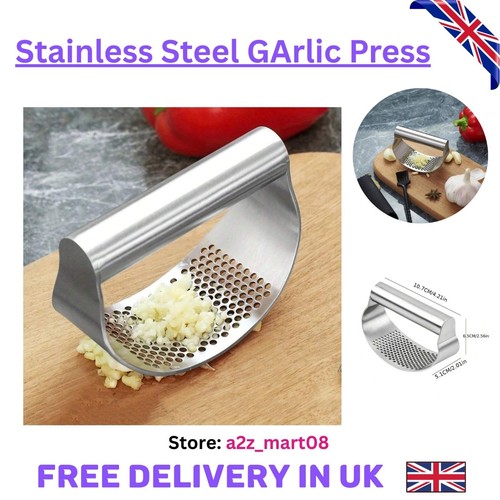 Stainless steel garlic press - garlic,